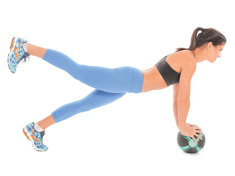 Tone your glutes with medicine ball leg lifts