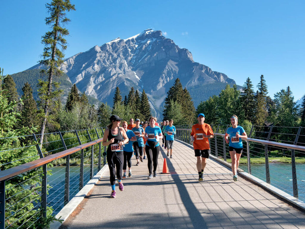 Participants run in the mountaints at the Banff Marathon