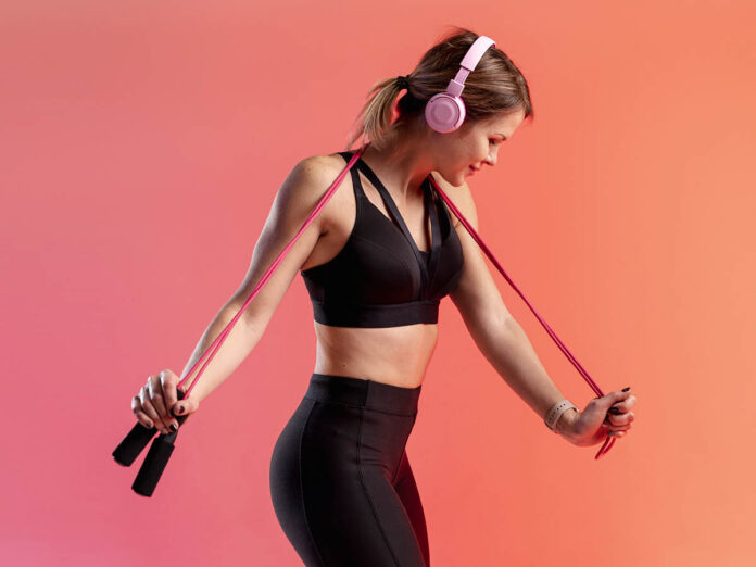 Woman Exercising With Headphones