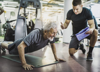 Older athlete with personal trainer