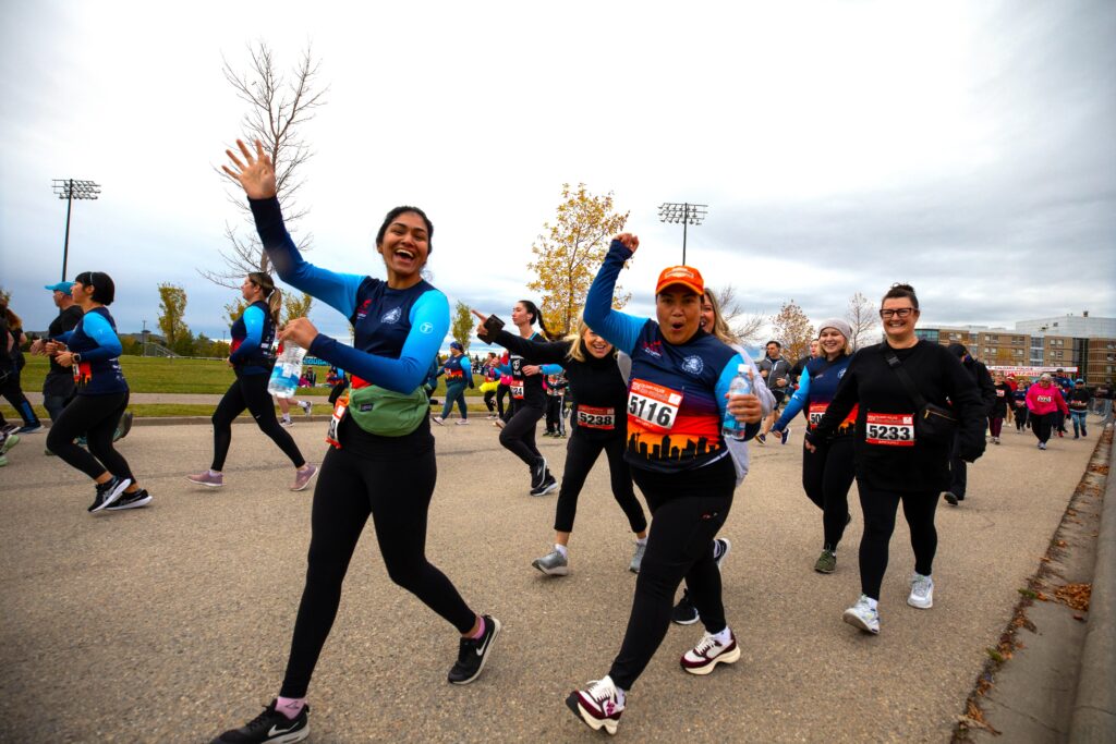 Participants strike a pose at the Calgary Police Classic Run YYC