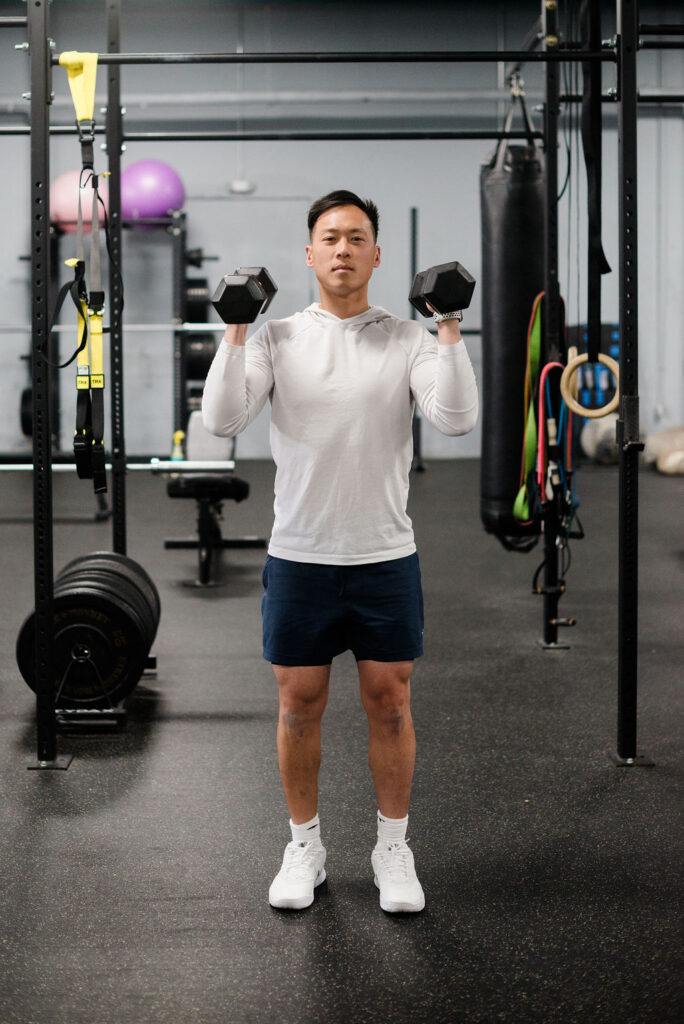 Dumbbell Swing Press
